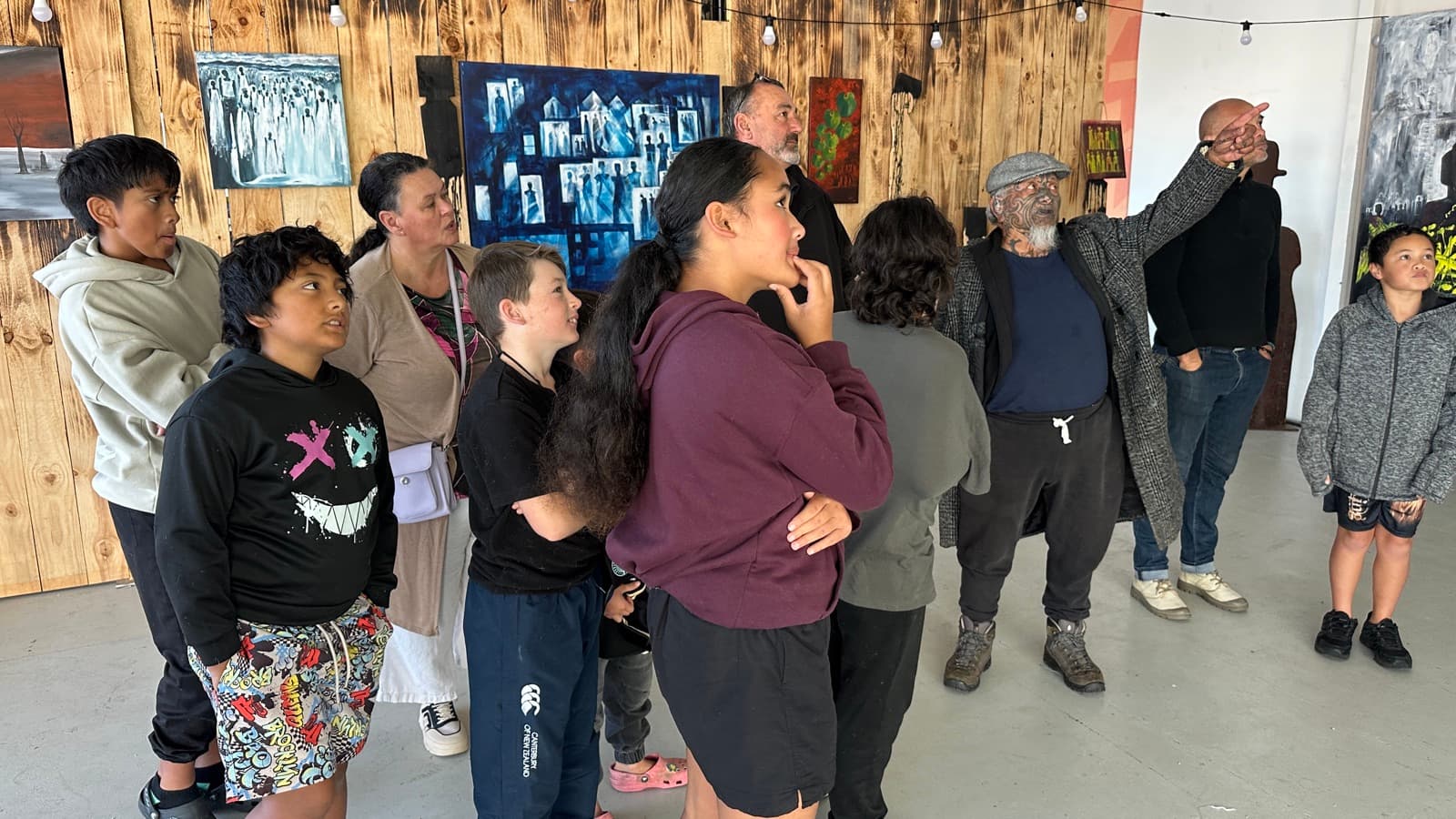 Toi on the walls, whānau in the whare